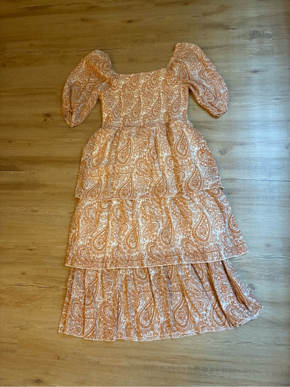 Tiered Midi Dress with Smocked Bodice in Rust Paisley